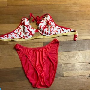 Venus bikini top. C. Red bottom size large.